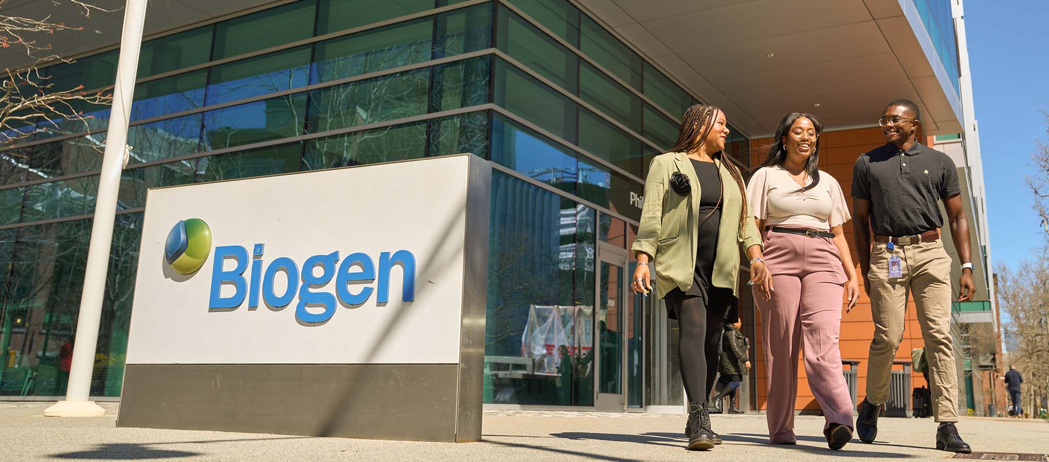 Group of Biogen employees outside building